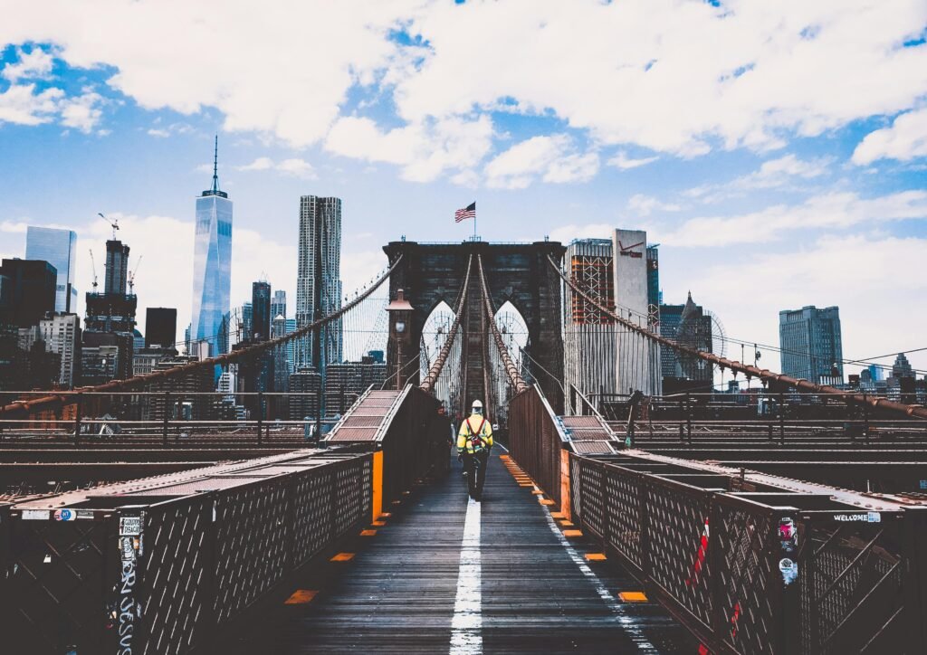 Man Walking on Bridge